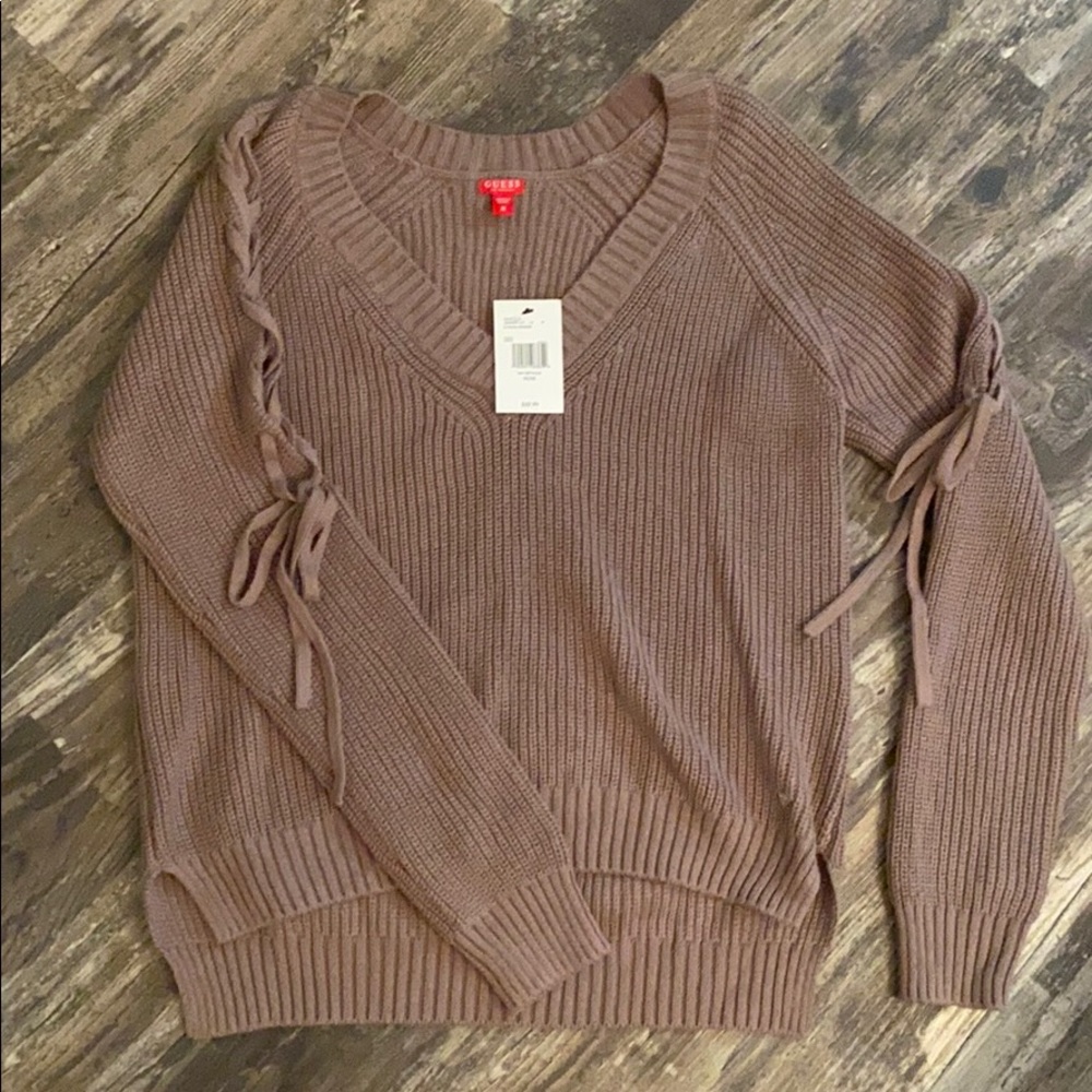 Guess women’s knit sweater with arm braid detail